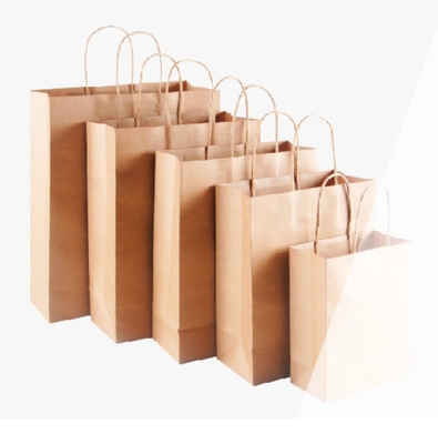 쇼핑을 위한 브라운 크래프트 선물 부대를 포장하는 식료품류 종이 봉지